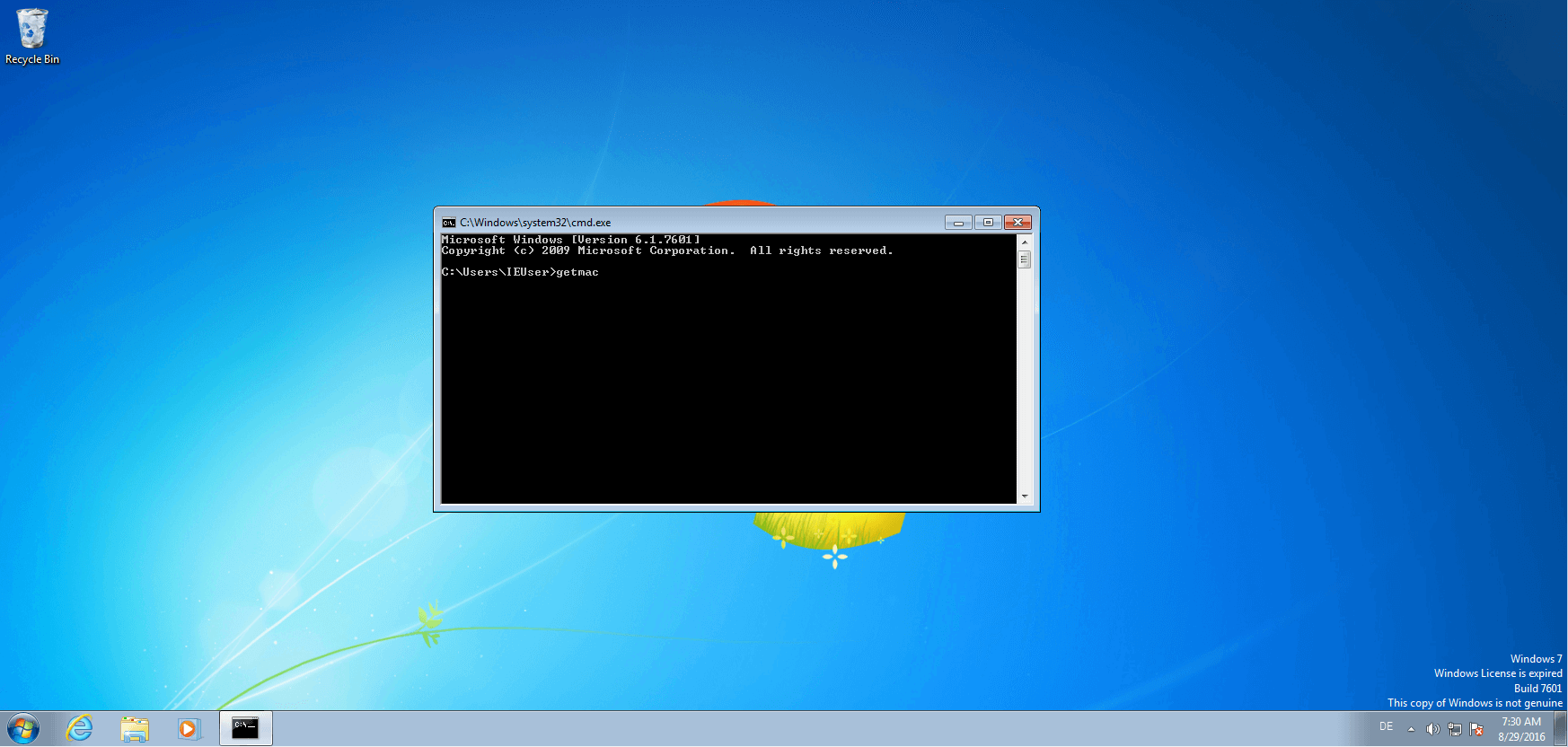 The command “getmac” in the Windows command prompt